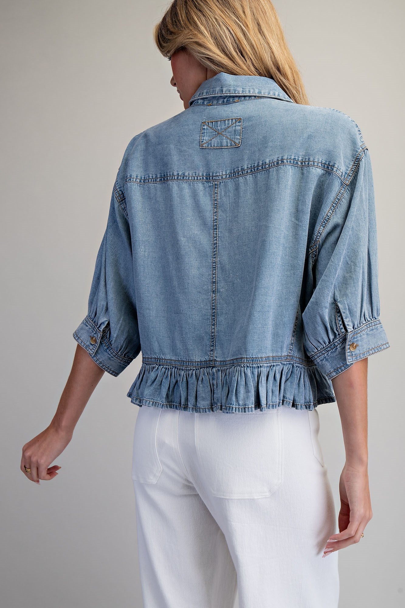 RUFFLED HEM BUTTON DOWN DENIM TOP